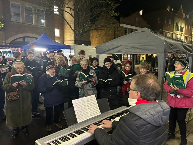 Choir and Phil in action